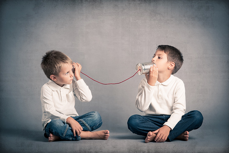 Young,Brothers,Talking,With,Tin,Can,Telephone,On,Grunge,Background.